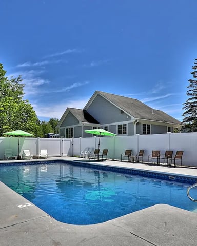 Outdoor pool at the community center of Killington Center Inn and Suites.