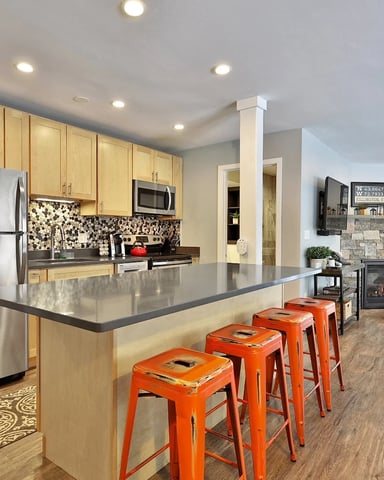 Killington Center kitchen with orange bar stools