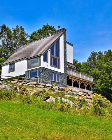 Vermont cabin exterior in the woods